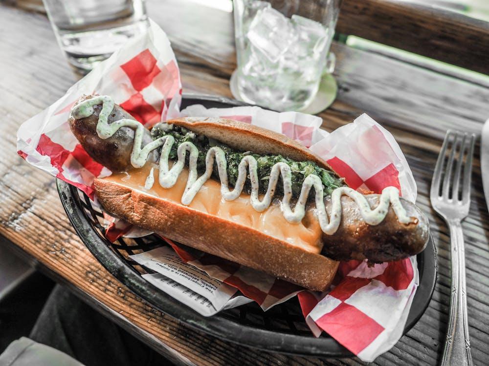 a freshly made loaded hotdog