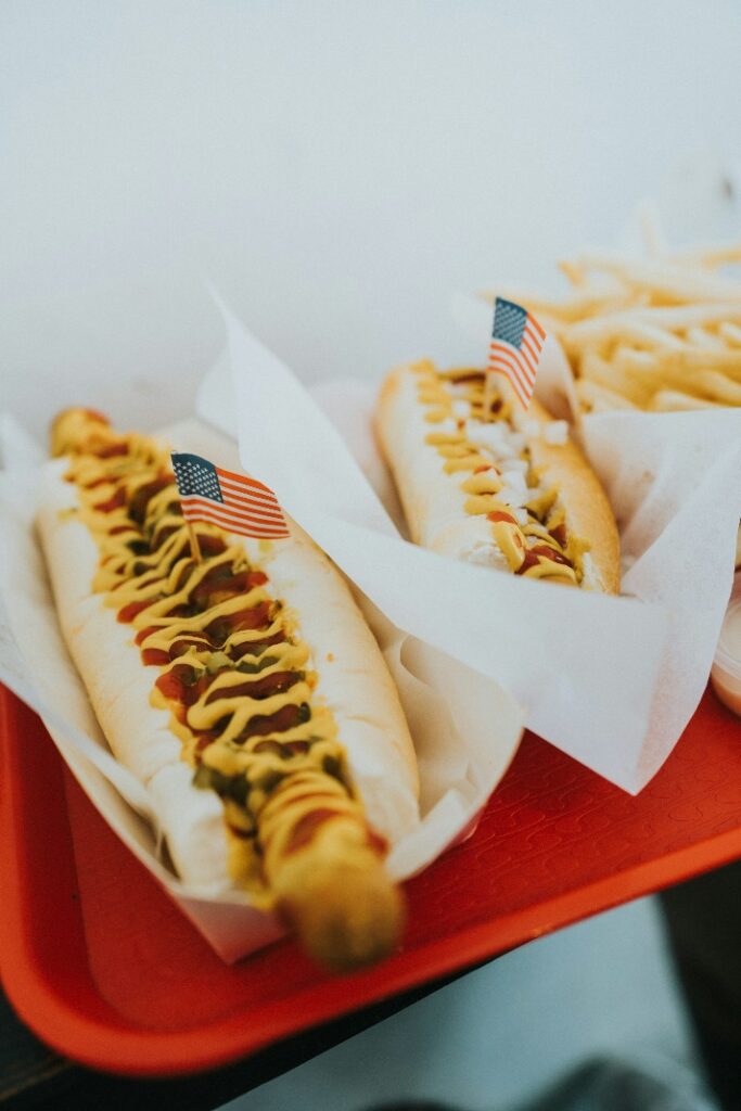 a closeup shot of two hot dogs